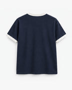 Navy Ringer Tee, navy with salt trim, back view. Generated pre-production design preview.