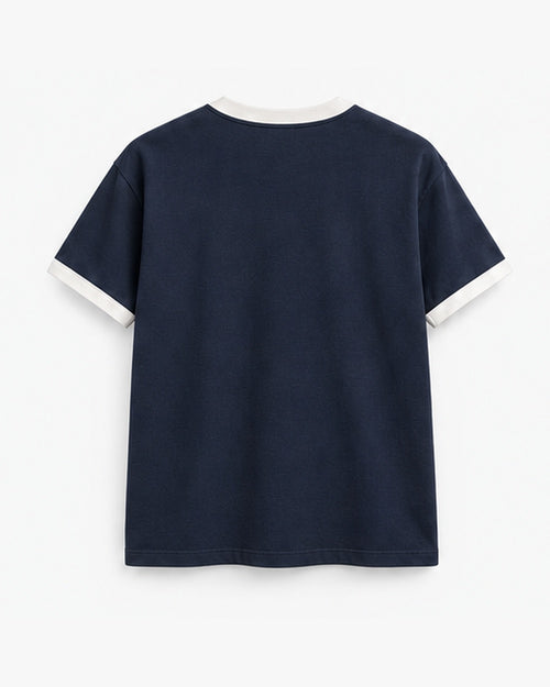Navy Ringer Tee, navy with salt trim, back view. Generated pre-production design preview.