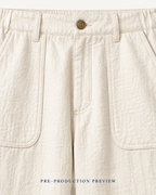 Generated pre-production artwork detail preview of Chalk patch-pocket trousers.
