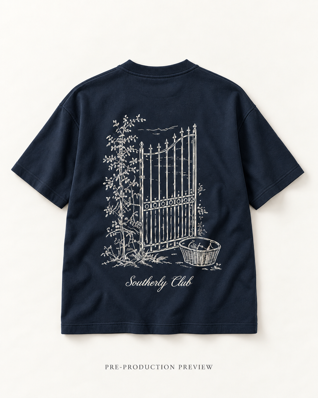 Generated pre-production flat lay preview of Courtyard Gate Graphic Tee 061.