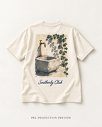 Generated pre-production flat lay preview of Quiet Basin Graphic Tee 084.