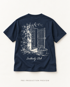 Generated pre-production flat lay preview of Courtyard Gate Graphic Tee 117.