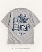 Generated pre-production flat lay preview of Garden Ladder Graphic Tee 158.
